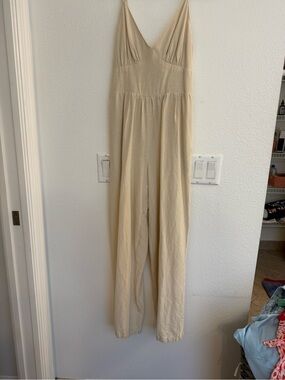 Sleeveless Cream V-Neck Wide-Leg Jumpsuit